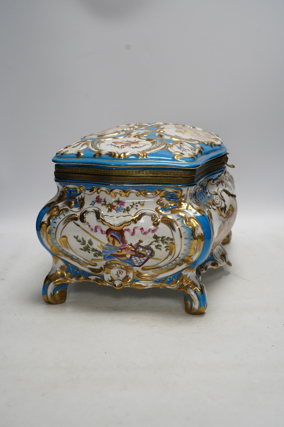 A large Sevres style porcelain casket, 33cm wide. Condition - good